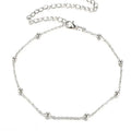 Women's metal anklet with geometric pendant on twisted chain