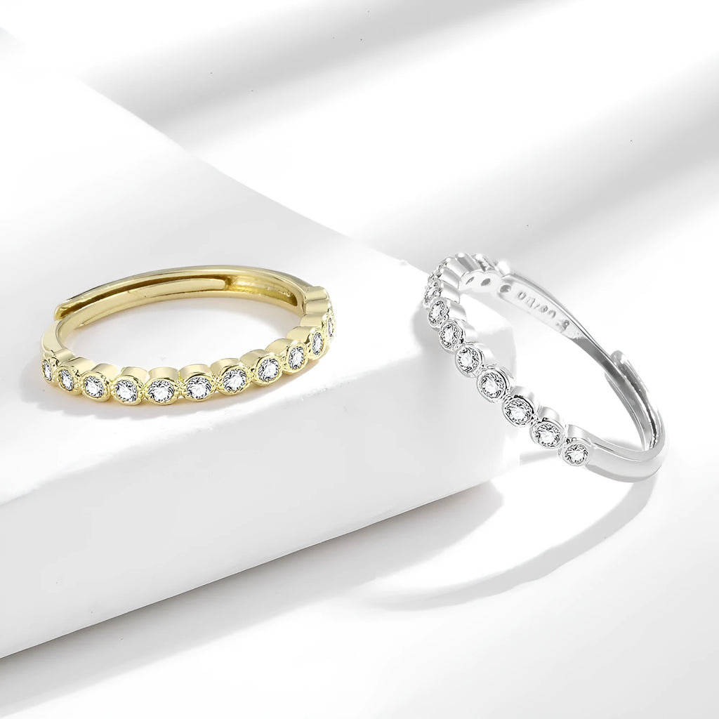 Geometric open-mouth women's ring with diamond tail detail in white gold or yellow gold colour finish.