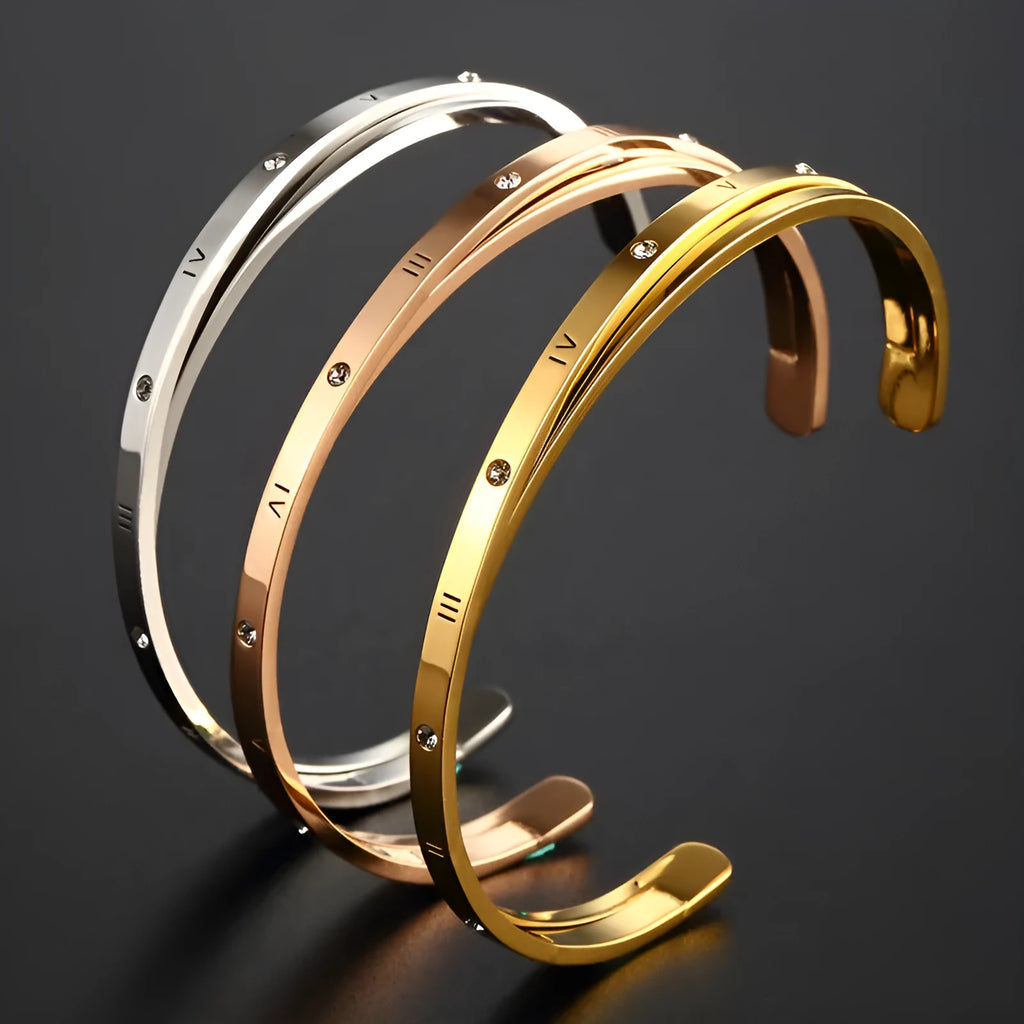 Open-ended stainless steel women's bracelet with zircon stones in rose, gold, or steel colour.