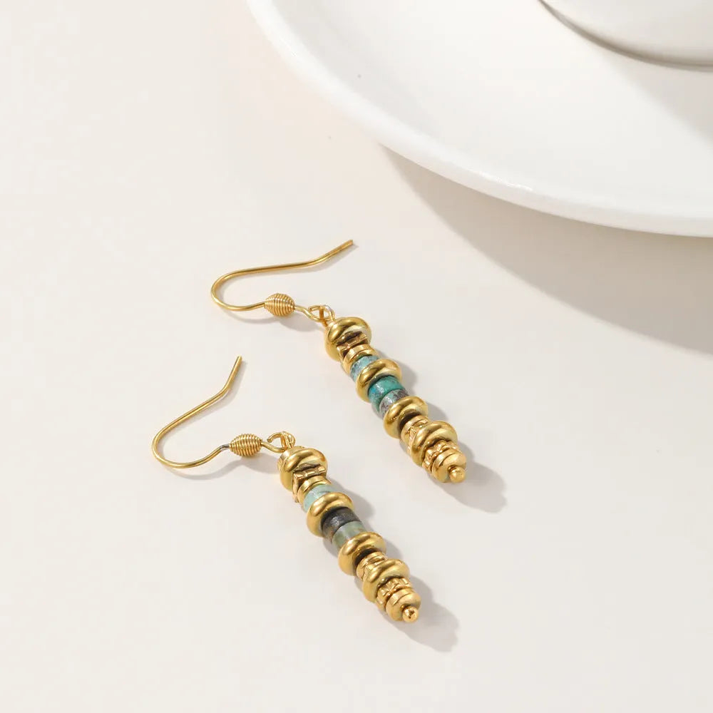 Geometric gold plated titanium steel dangle earrings with a retro design.