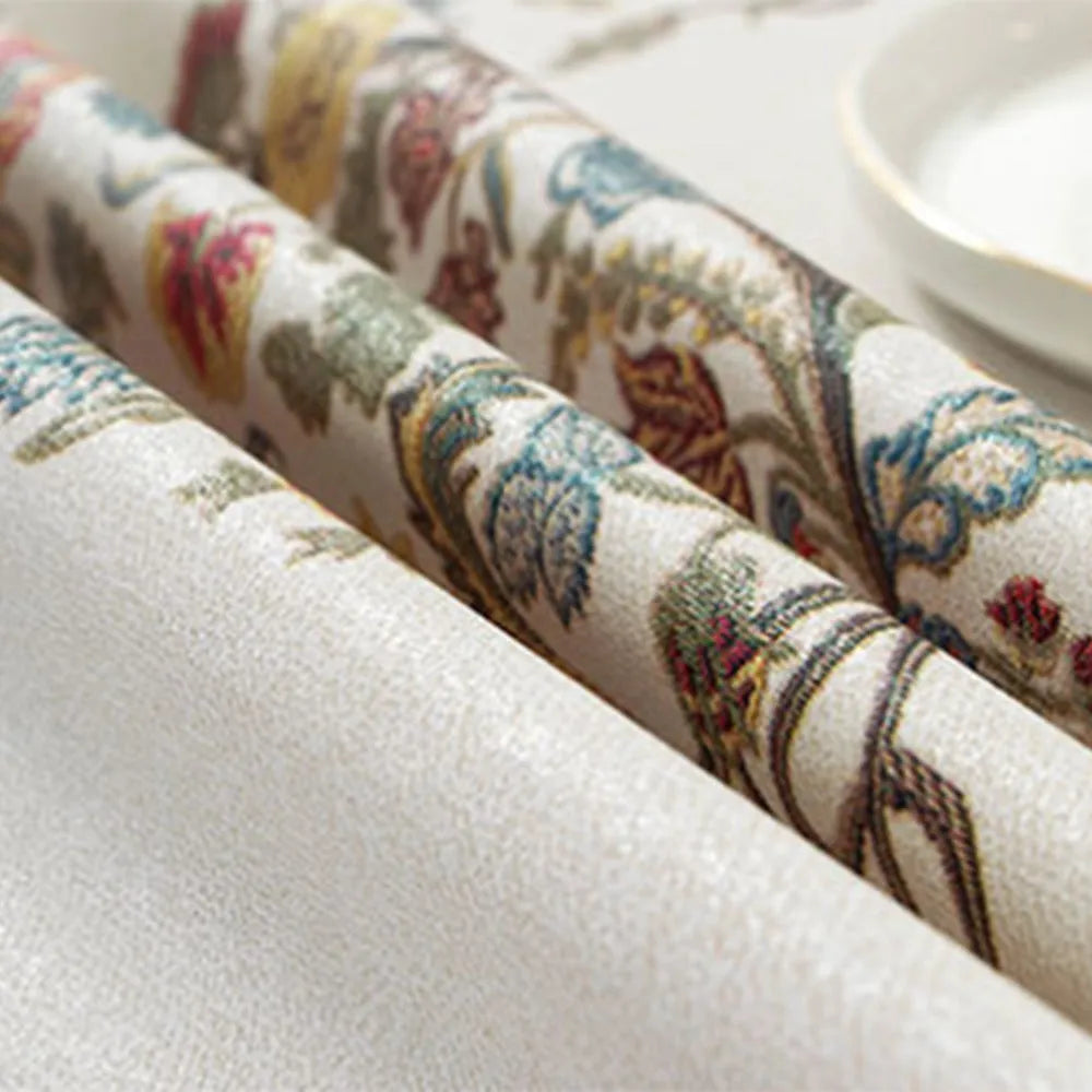 Rectangular PVC tablecloth on a coffee table, showing a geometric pattern and non-slip backing.