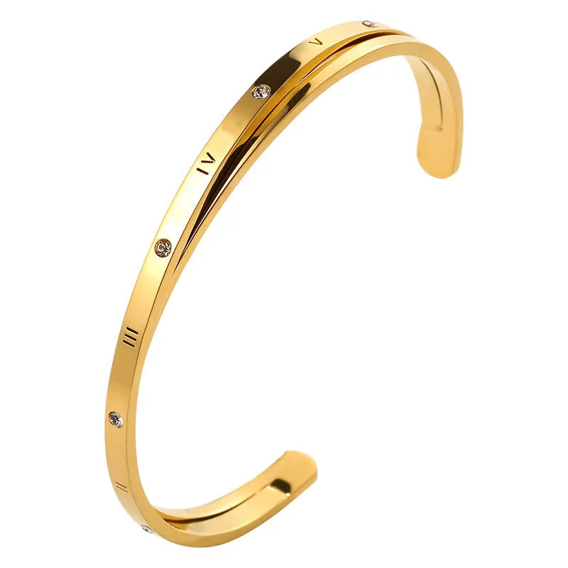 Open-ended stainless steel women's bracelet with zircon stones in rose, gold, or steel colour.