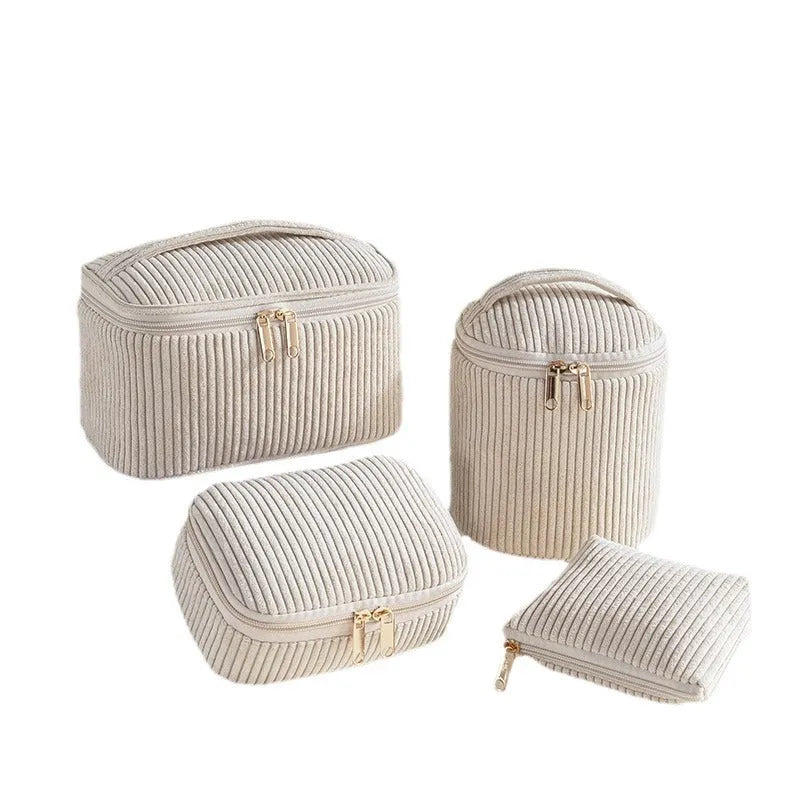 Flannelette makeup bag four-piece set in cube style, showing colour options of pink, khaki, pink dots, and blue with dots.