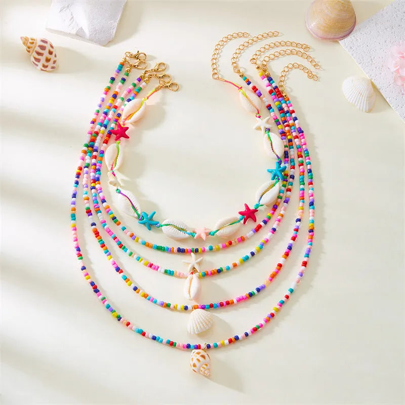 Blue multi-layer women's necklace with starfish shell beads and adjustable chain