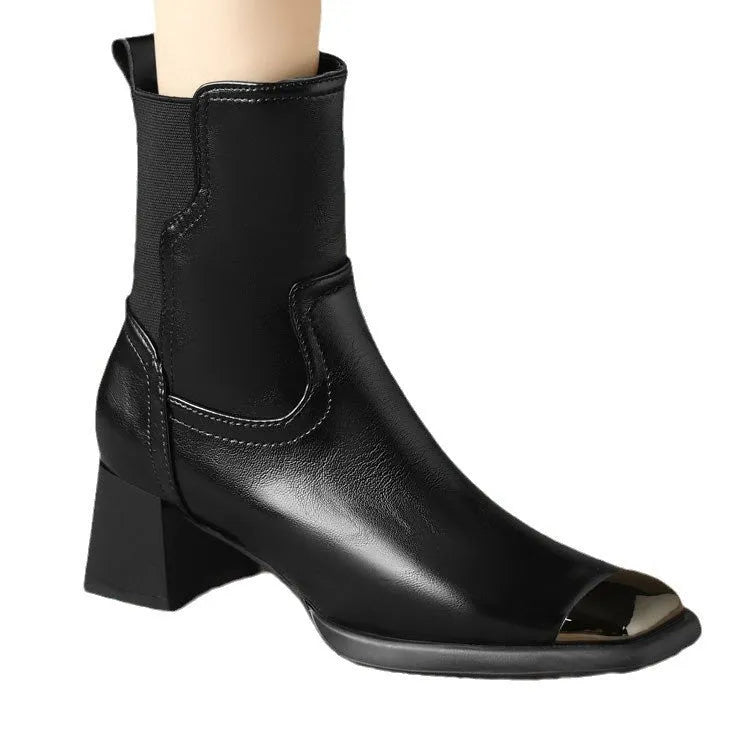 Brown high-heel Martin boots with side zipper and decorative metal rivet details.