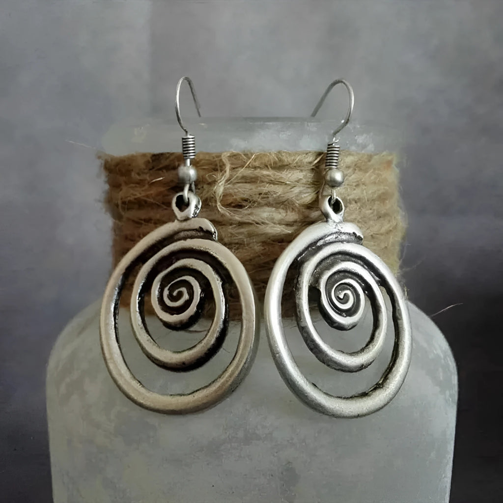 Silver geometric spiral distressed earrings with tribal design measuring 2.6 by 5 cm