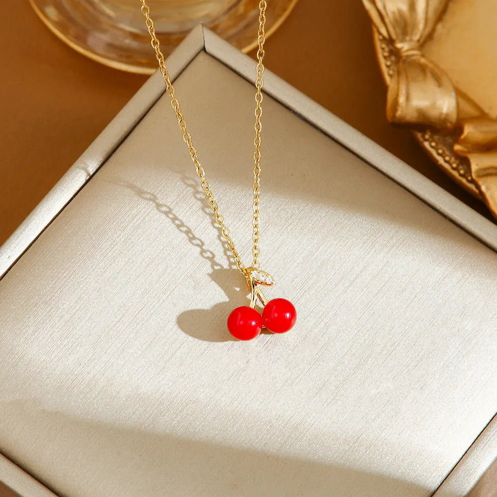 Titanium steel necklace with a detailed strawberry charm pendant on an O-ring chain.
