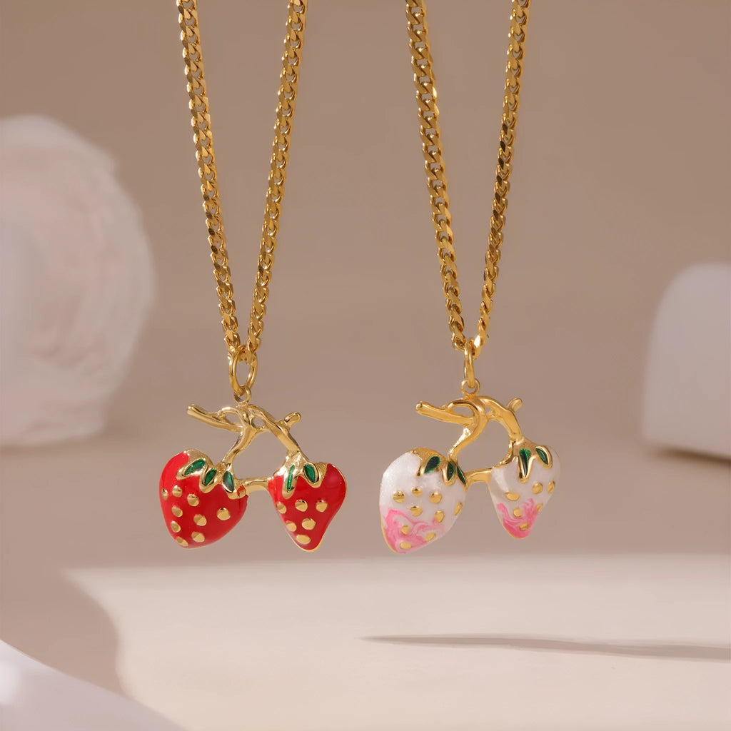 Stainless steel strawberry pendant necklace on an alloy chain in red or white powder gradient.