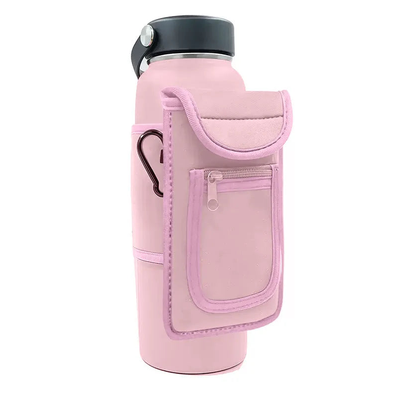 Fitness magnetic water bottle sleeve in black with a carabiner clip, shown on a sports bag.