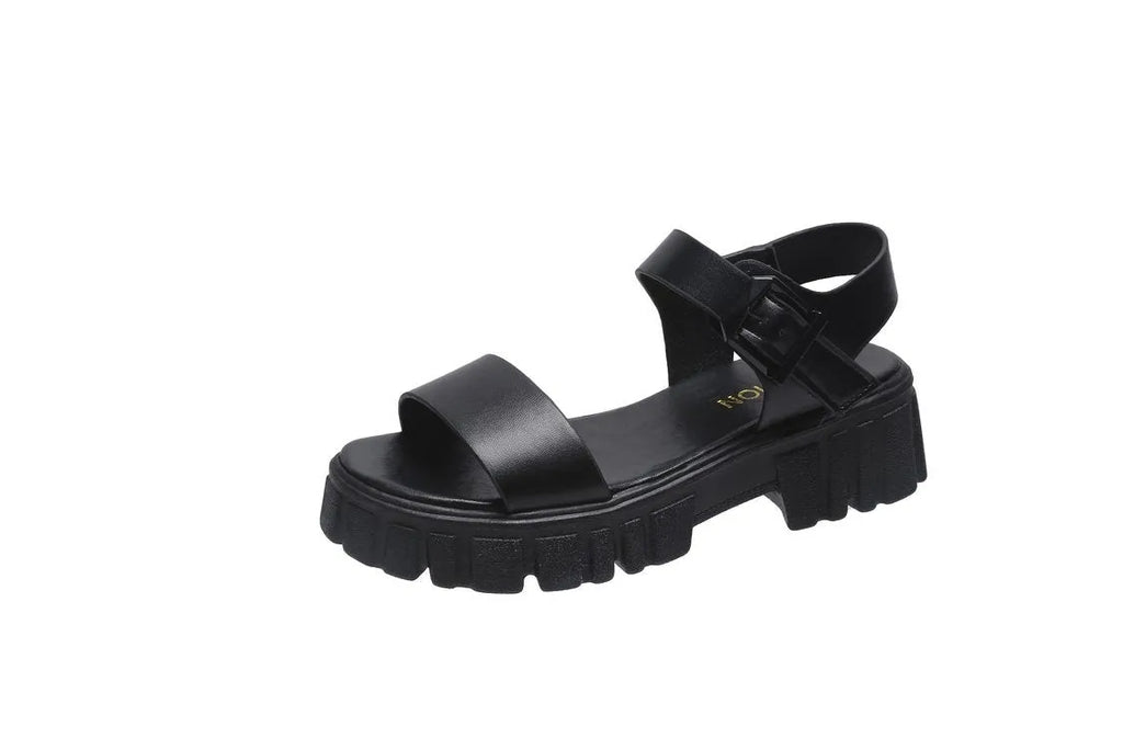 Women's beige peep toe sandals with an ankle strap buckle and a platform sole, shown from the side.
