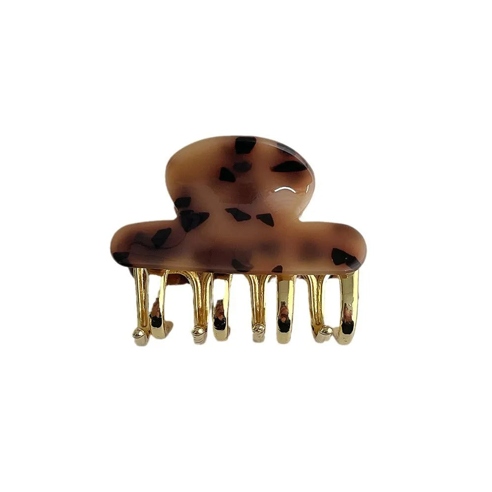 Women's hair barrettes with metal grip in alloy acrylic showing four colour options