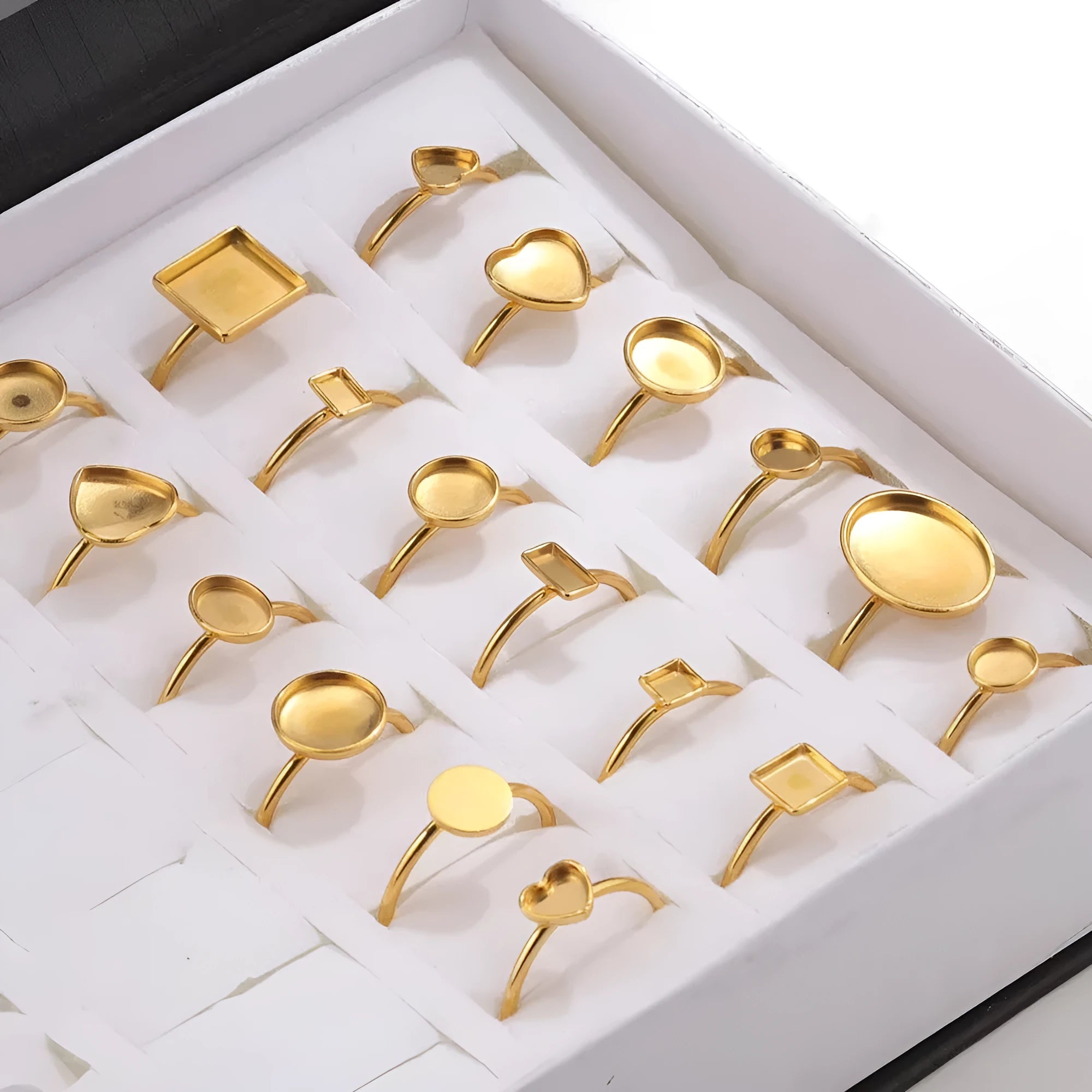 Golden-toned stainless steel ring holder with totem pattern and multiple shape options for jewellery organisation
