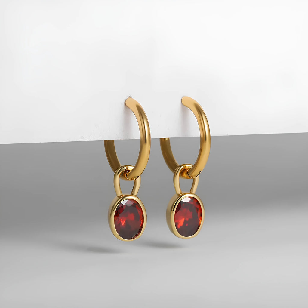 Women's retro-style oval earrings with zircon details on a copper base in six colour options.