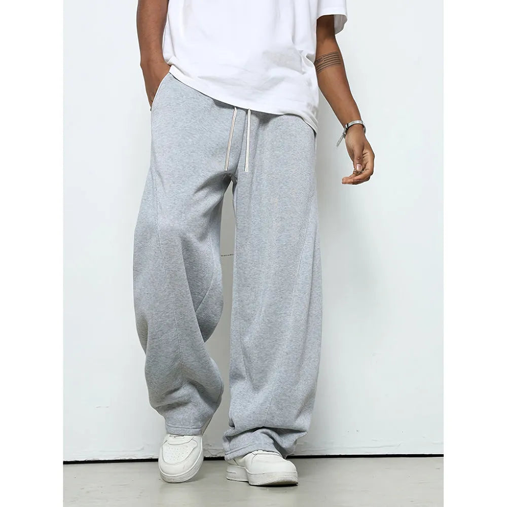 Men's solid colour polyester trousers with straight leg and drawstring waist in black, dark grey, light grey