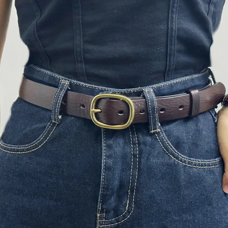 Handmade vintage-style women's leather belt with copper buckle in brown.