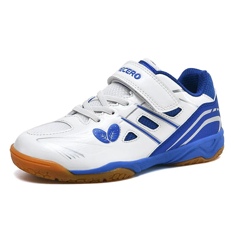 White and blue PVC low-top badminton shoes with hand-painted detail and a ribbed sole.