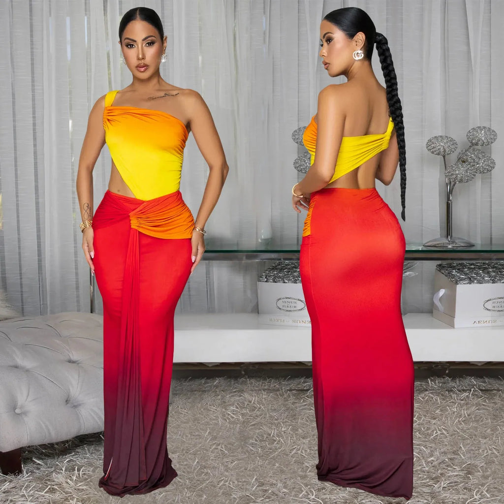 Long red gradient women's dress with cross-shoulder sleeveless neckline and high waist.