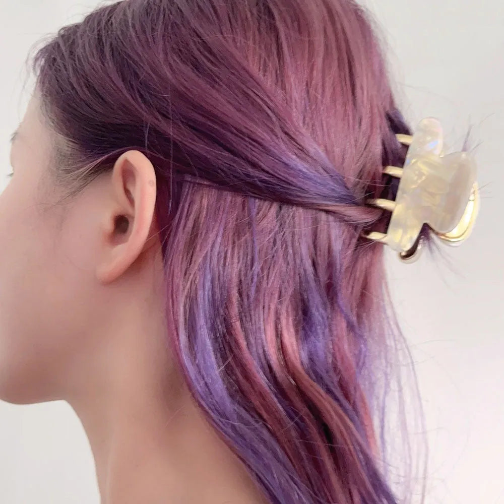 Women's hair barrettes with metal grip in alloy acrylic showing four colour options