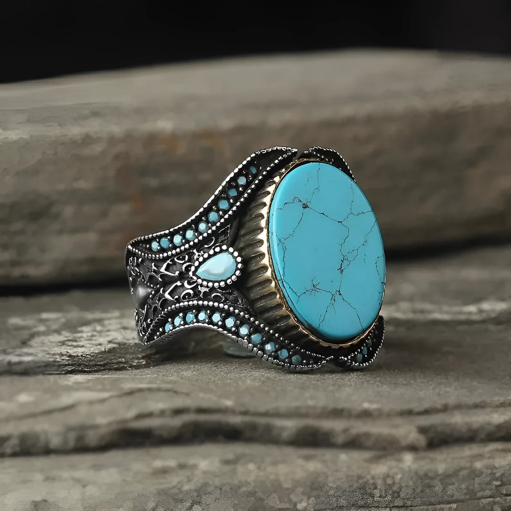Men's antique silver turquoise alloy ring showing simple round band design on a size guide.