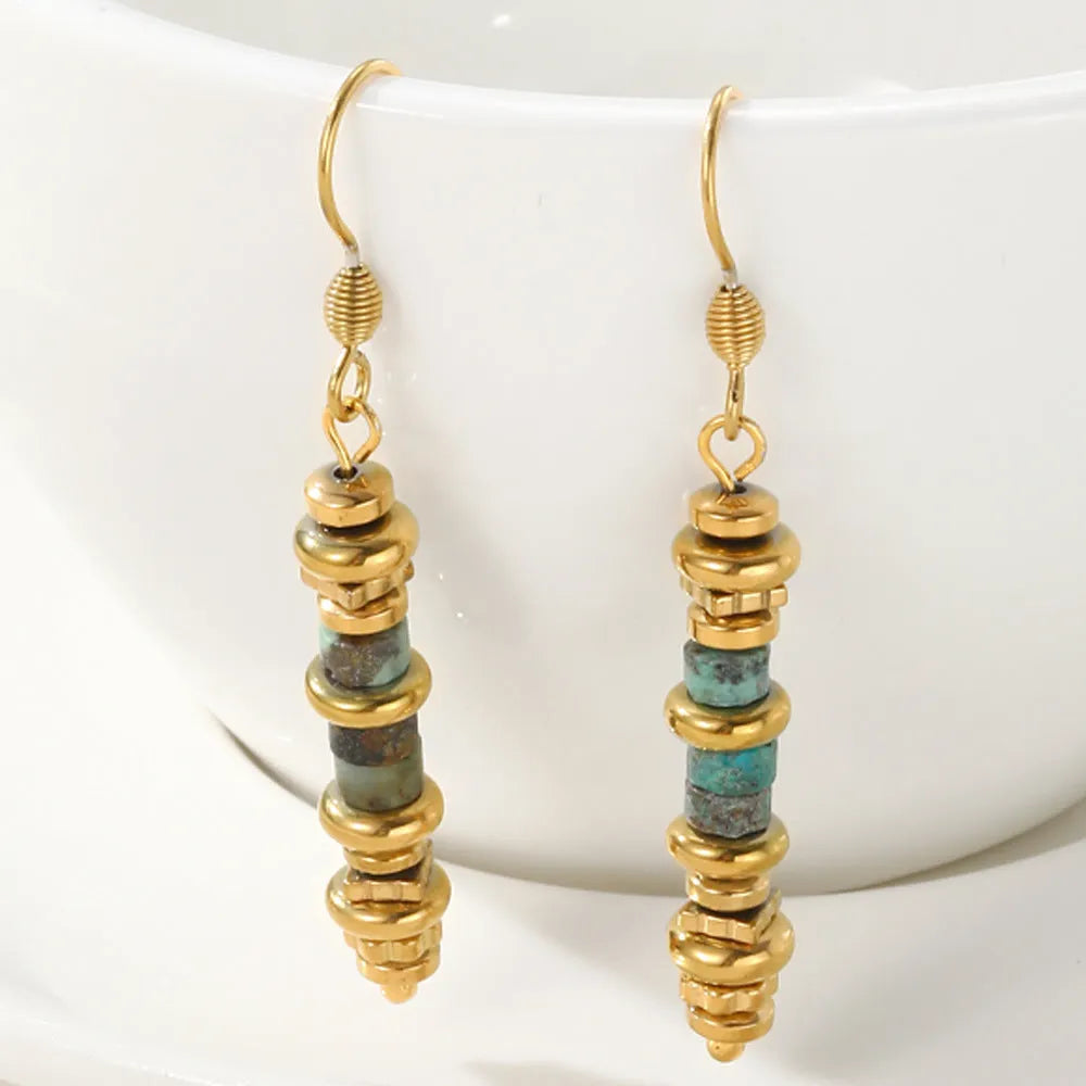Geometric gold plated titanium steel dangle earrings with a retro design.