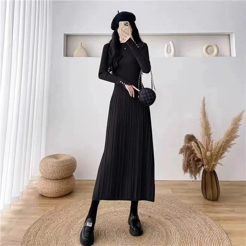 Women's high-waisted A-line acrylic knit dress in solid colour.