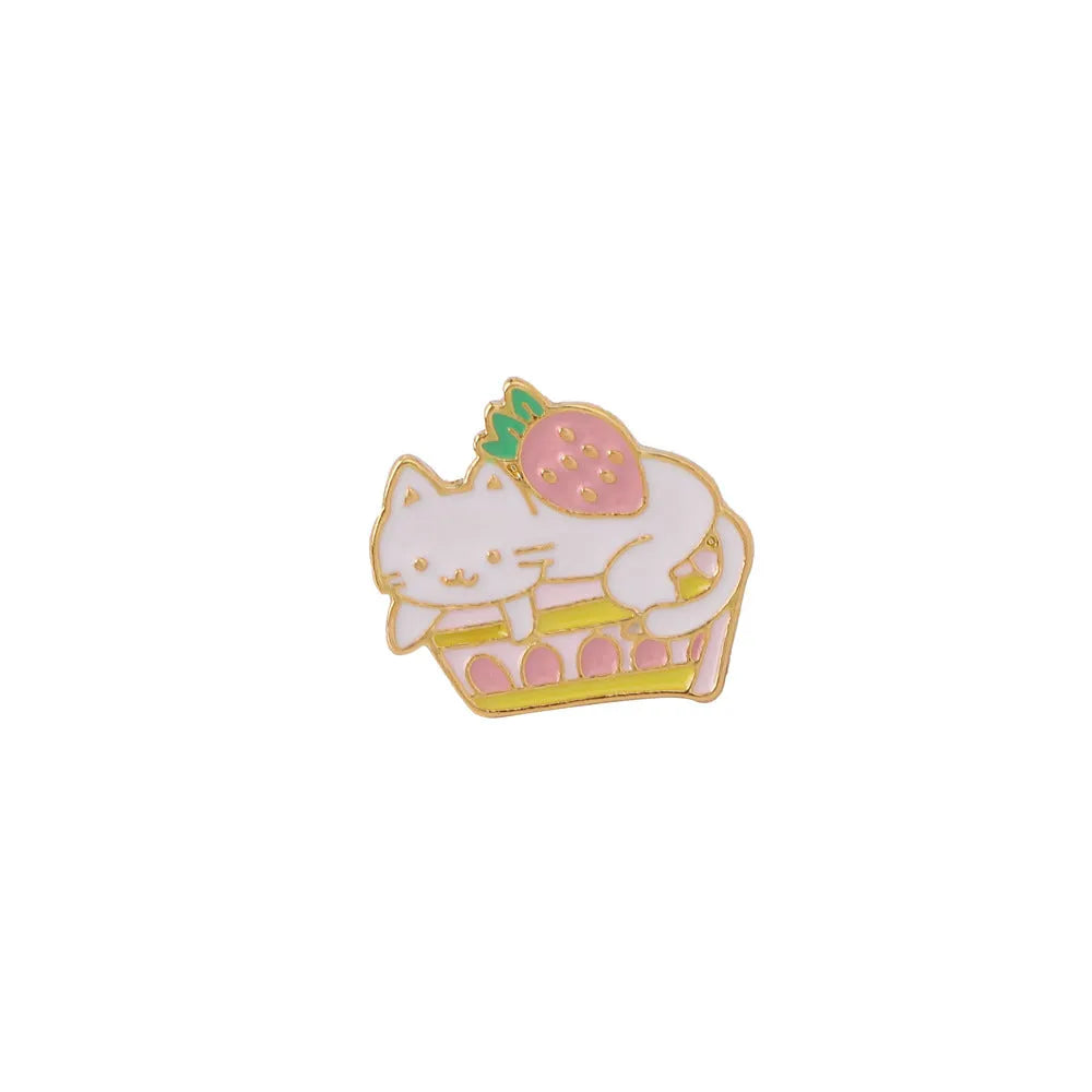 Alloy metal brooch shaped like a cat with a strawberry cake and dripping oil decoration.