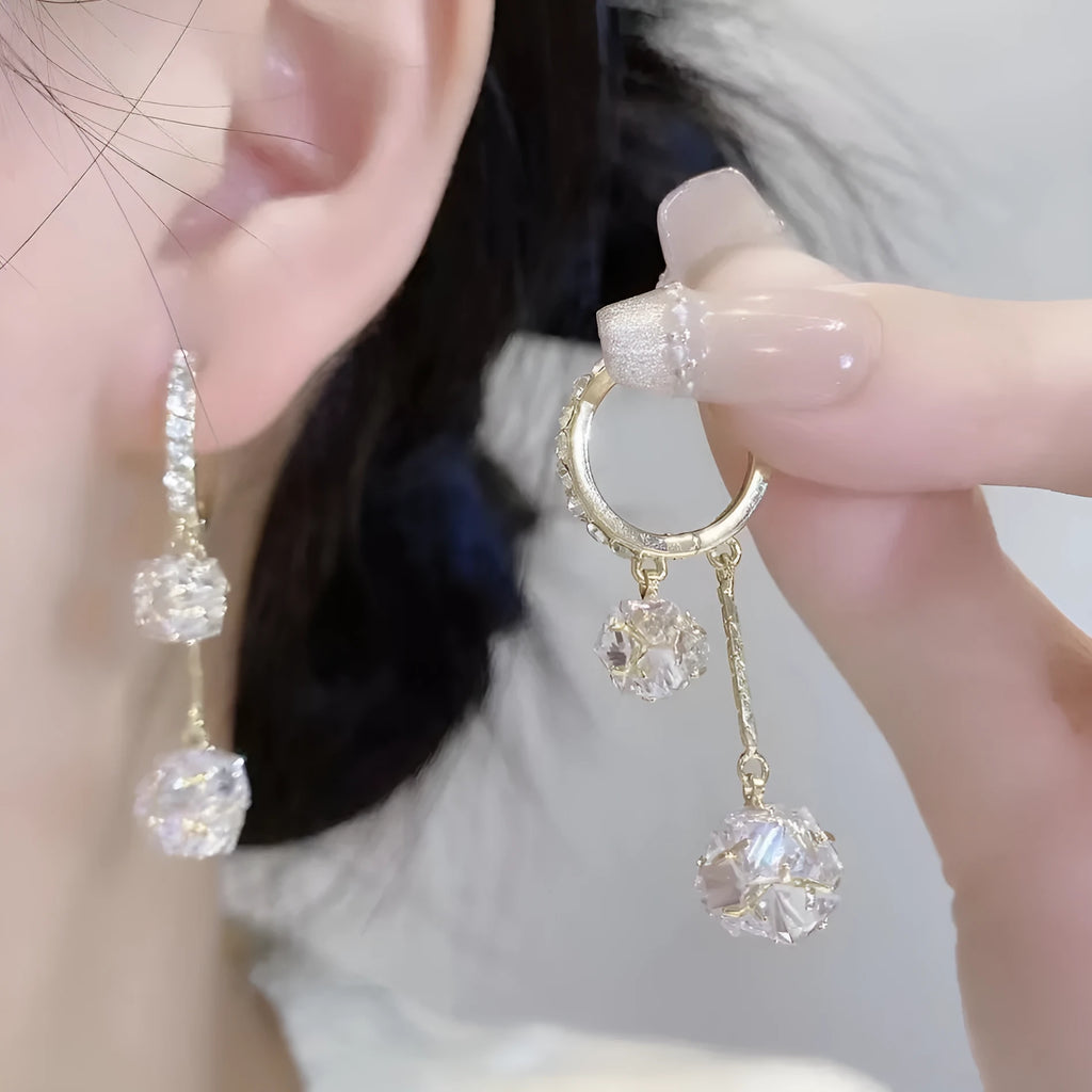 Silver confession balloon tassel earrings with rhinestone balls and drop shape design