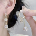 Silver confession balloon tassel earrings with rhinestone balls and drop shape design