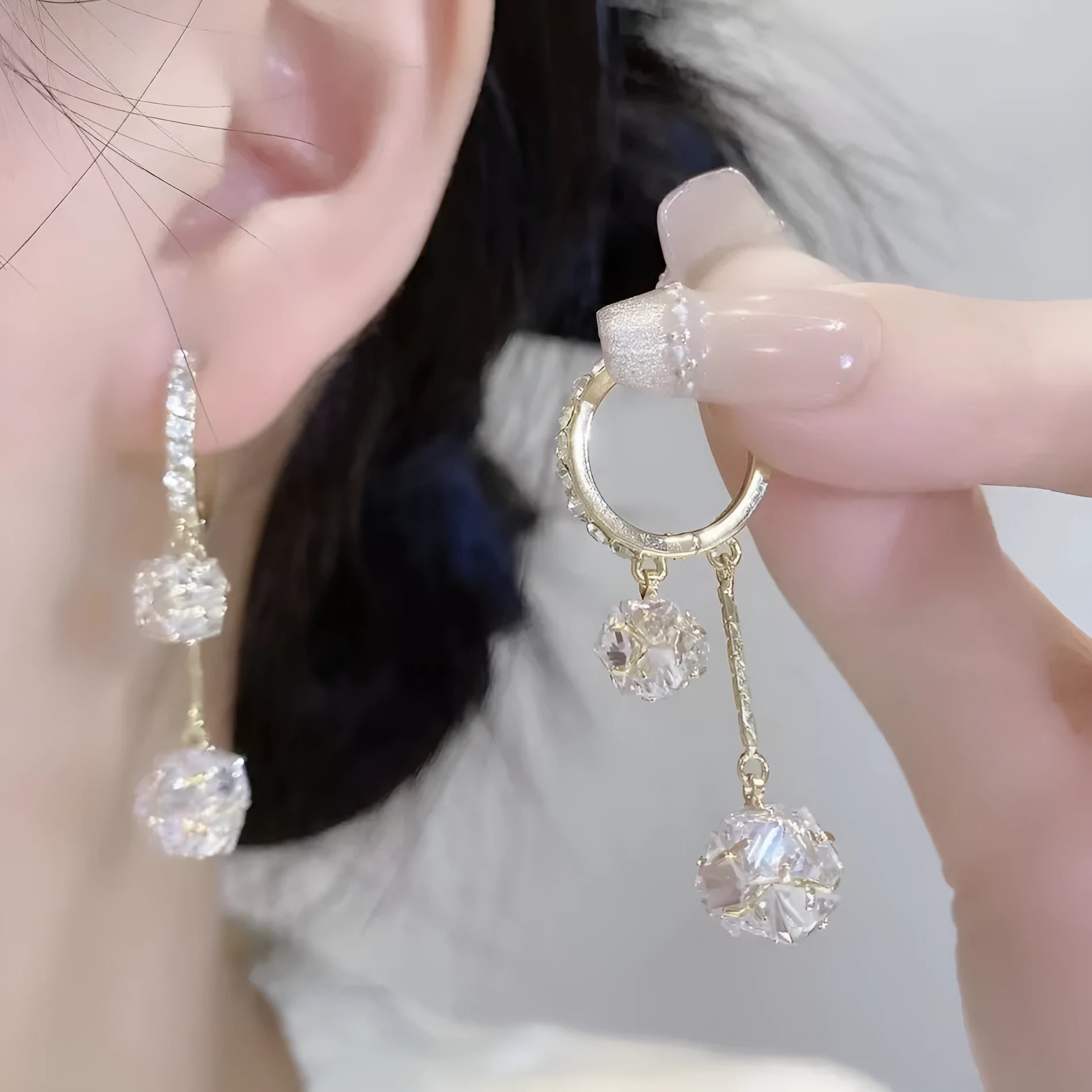 Silver confession balloon tassel earrings with rhinestone balls and drop shape design