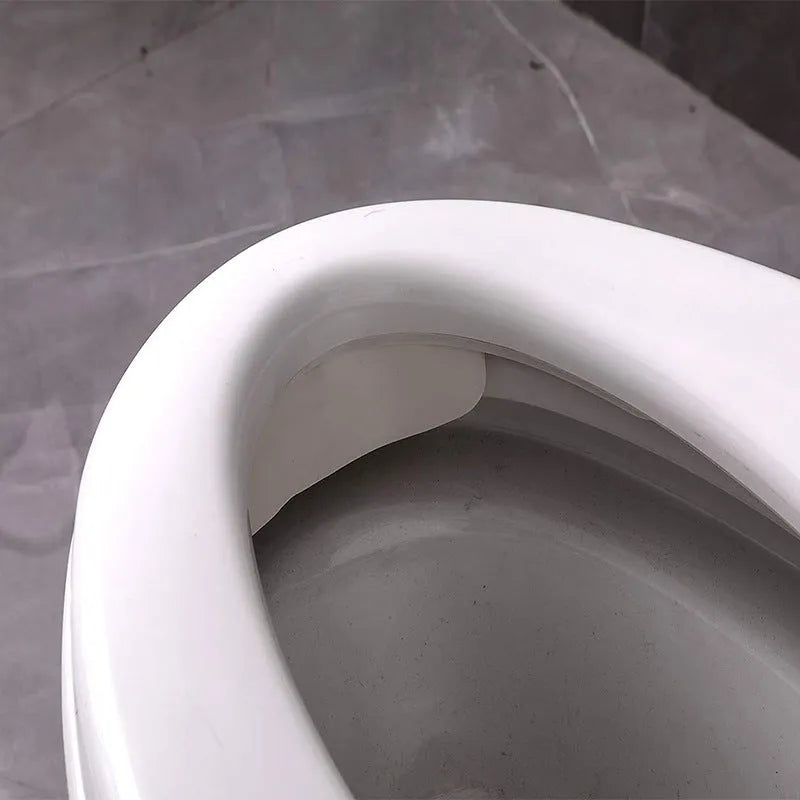 White PVC urine blocking board for toilet, child potty training splash guard.
