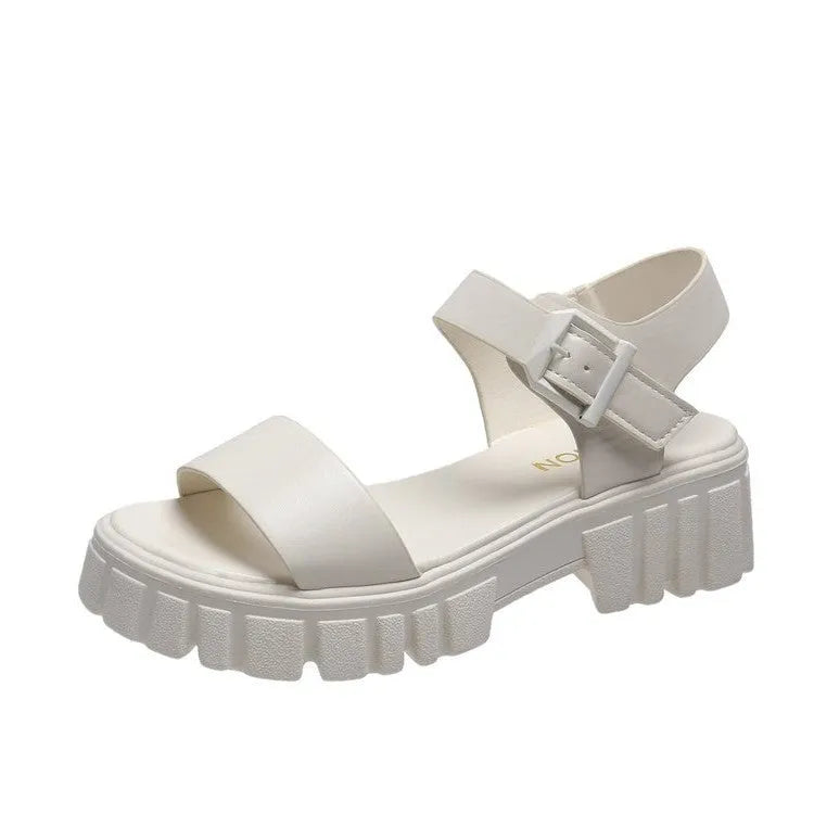 Women's beige peep toe sandals with an ankle strap buckle and a platform sole, shown from the side.
