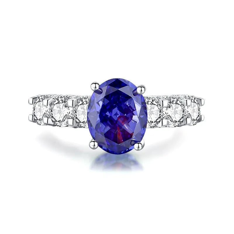 Heart-shaped sterling silver ring with a high carbon diamond ice flower cut colour zircon stone.