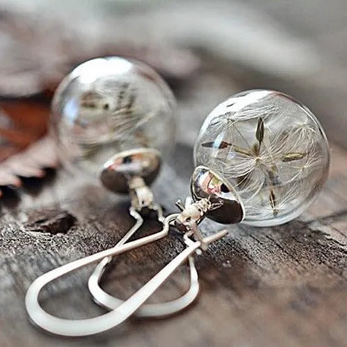 Transparent glass ball earrings with dandelion seed crystal design in silver French hooks