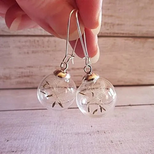 Transparent glass ball earrings with dandelion seed crystal design in silver French hooks