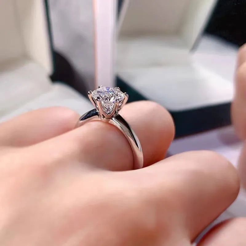 White gold plated geometric women's ring with six-claw zircon setting on finger