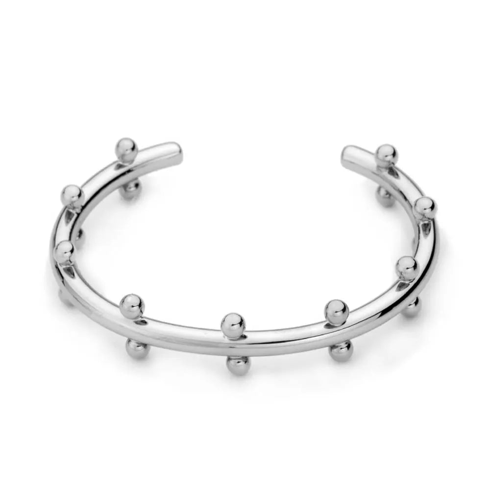 Stainless steel C-shaped bracelet with textured bean beads and rivet details in gold, steel colour, or steel colour gold finishes