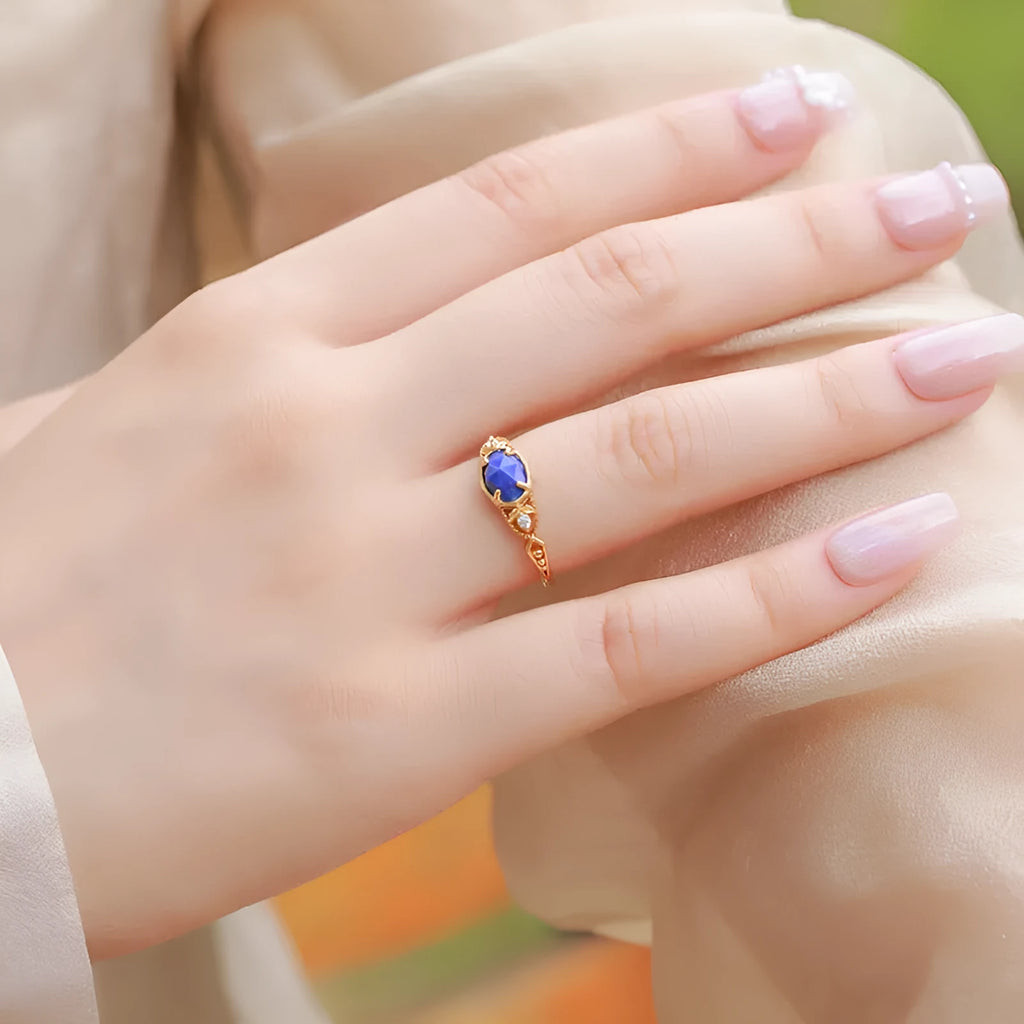 Women's geometric ellipse lapis lazuli ring on a silver alloy band, showcasing Japanese-inspired design.