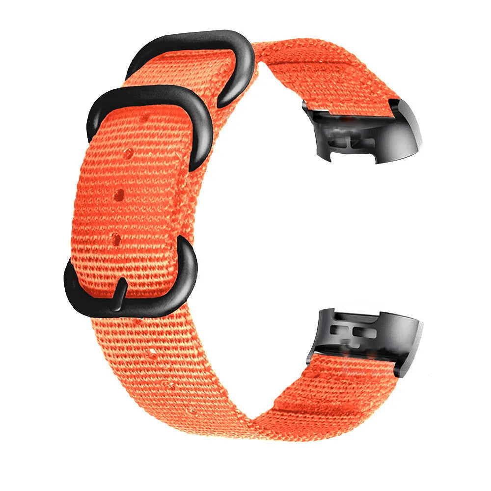 Nylon three-ring buckle replacement strap for Fitbit Charge 2, 3, 4, and 5 fitness trackers in multiple colours