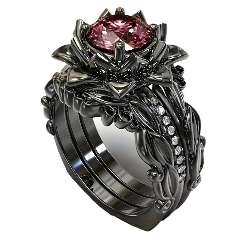 Rose design alloy ring with zircon inlay, shown in rose gold, black pink diamond, and black seven-colour rhinestone colour options.