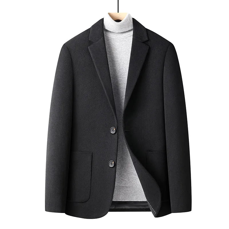 Men's slim-fit grey wool suit jacket with a notch lapel, shown on a hanger.