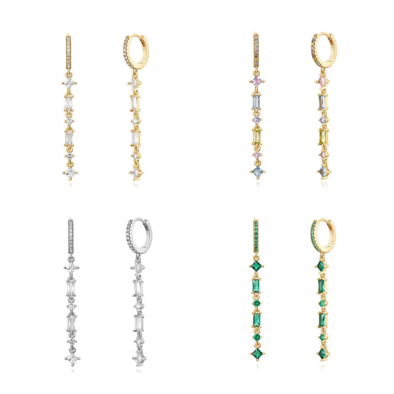 Geometric U-shaped silver tassel ear clip with micro-inlaid colourful zircon stones and dot, ring, and line details.