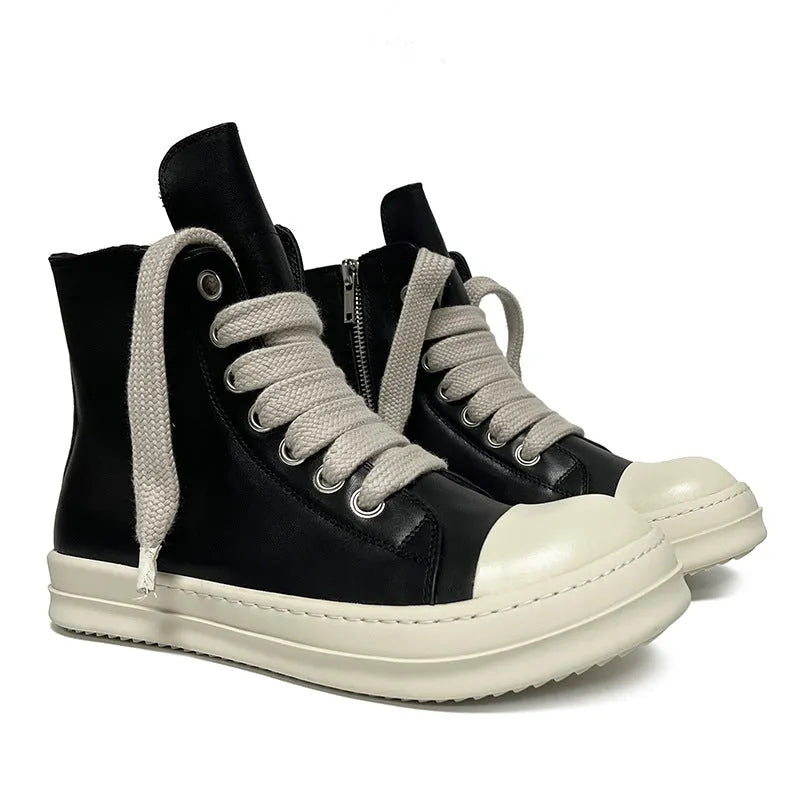 Black leather high-top sneakers with side zipper and round toe on a rubber platform sole