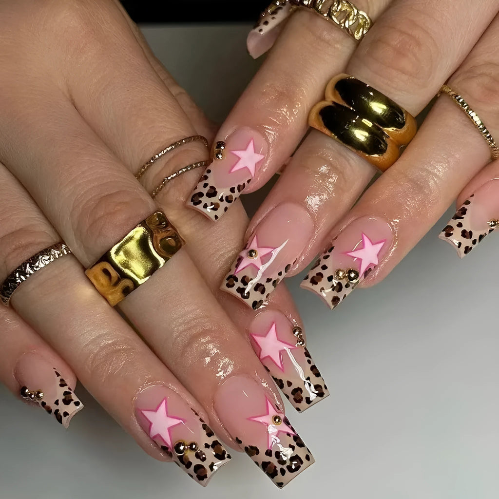 French style leopard print nail art strips with pearl and five-pointed star decorations for manicures.