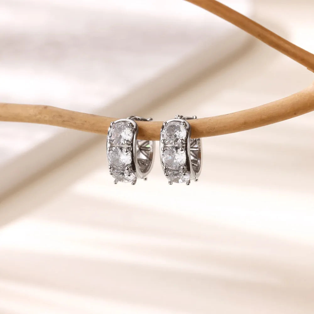A pair of women's U-shaped clip-on earrings in stainless steel with zircon stones, colour E5772P.