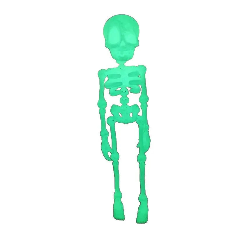 3D printed white skull refrigerator magnet with intricate details on a metallic surface.