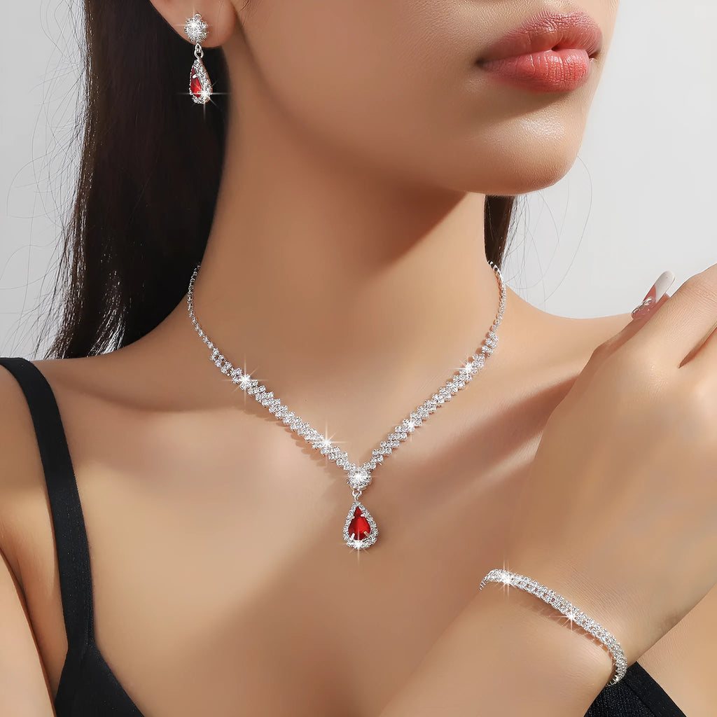 Claw chain necklace and earrings set with drop rhinestones in multiple colour options