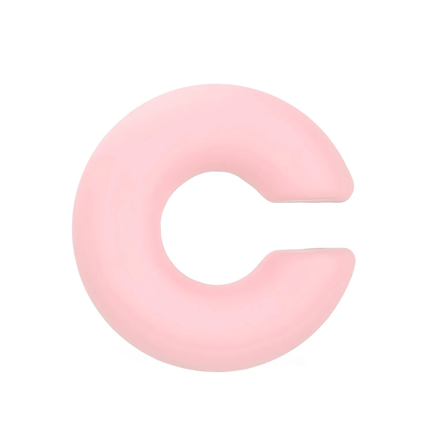 Close-up of a pair of matte coarse round C-shaped clip-on earrings for women in a candy colour.