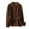 Yellow brown retro women's coat with Peter Pan collar and leather belt on a hanger.