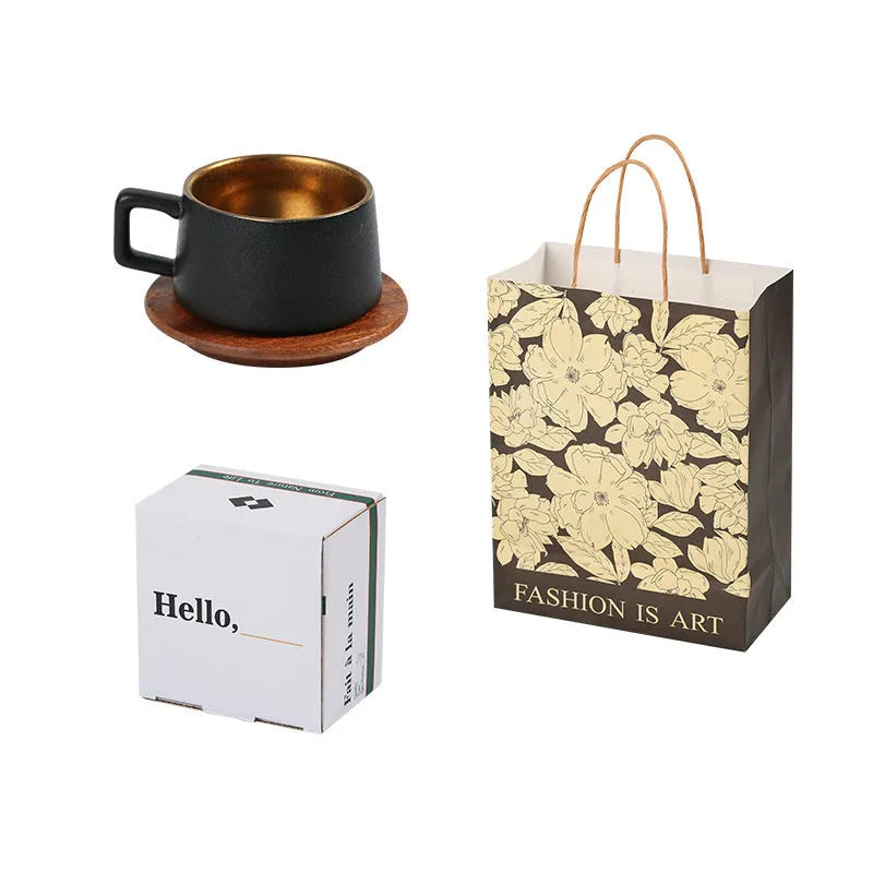 Gold and silver-plated gift boxes containing a solid colour 250ml tumbler cup and optional gift bag.