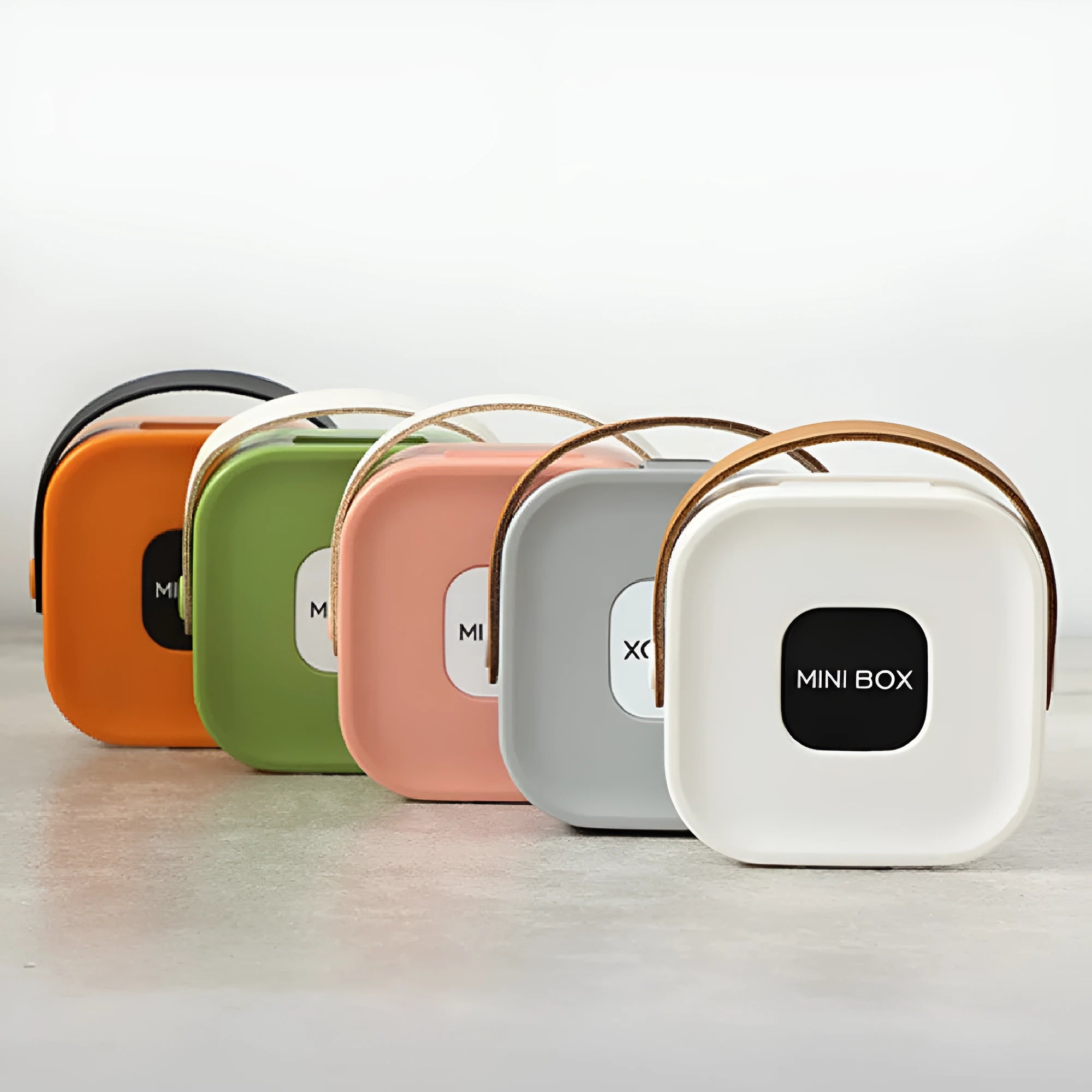A medium-sized polypropylene storage box for organising cables, shown in Nordic White.